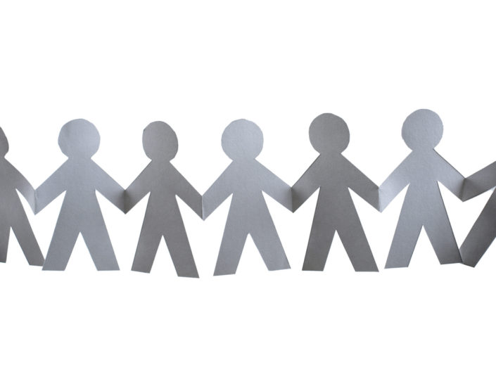 A paper chain of people figures