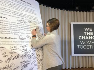 CEO of Mission Partners, Carrie Fox signing the WeTheChange declaration