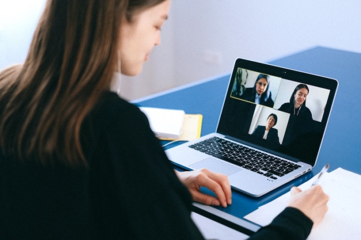 A woman at a virtual meeting
