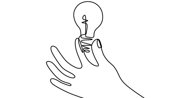 hand holding lightbulb