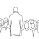 A person stands facing a crowd. They are giving a speech. The image is a line drawing.