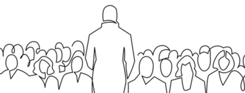 A person stands facing a crowd. They are giving a speech. The image is a line drawing.